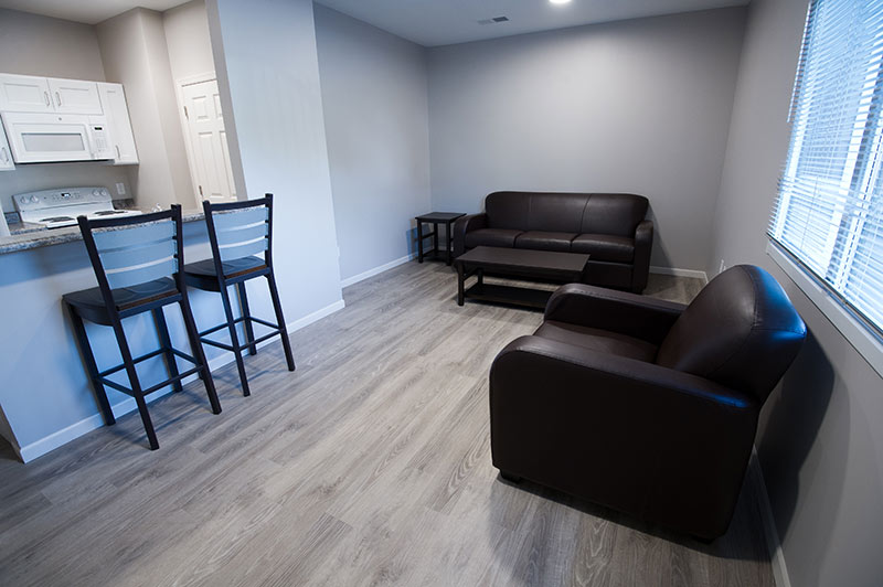 Living room with sofa and chairs