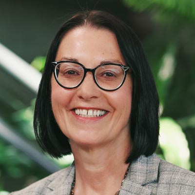 Smiling lady with glasses