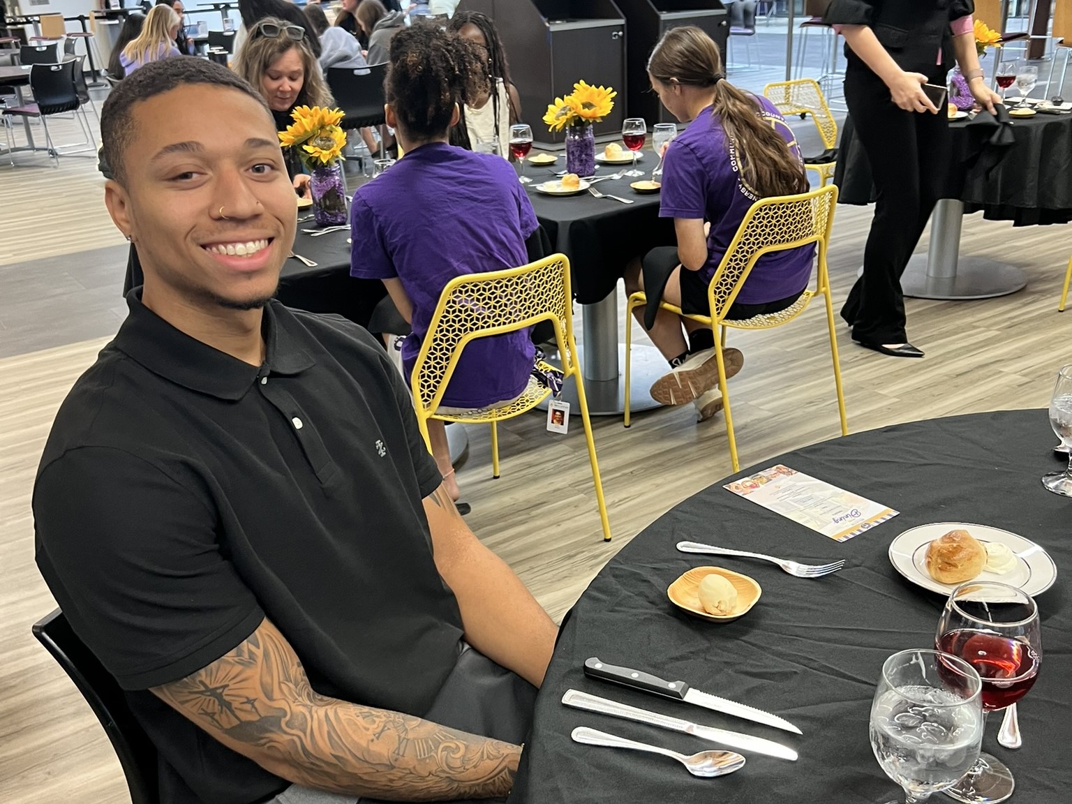 student at program event