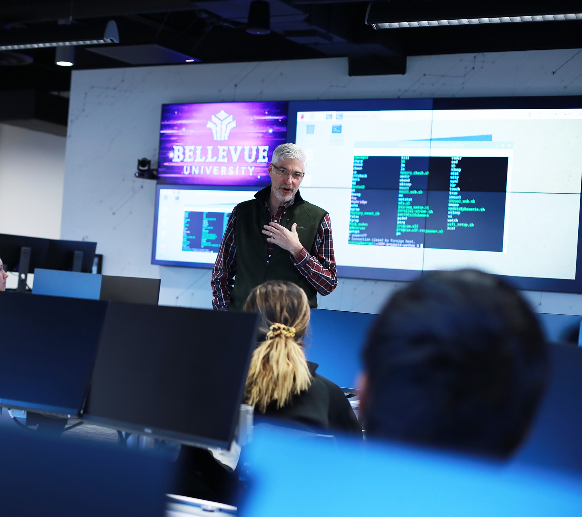 Professor lecturing in front of classroom