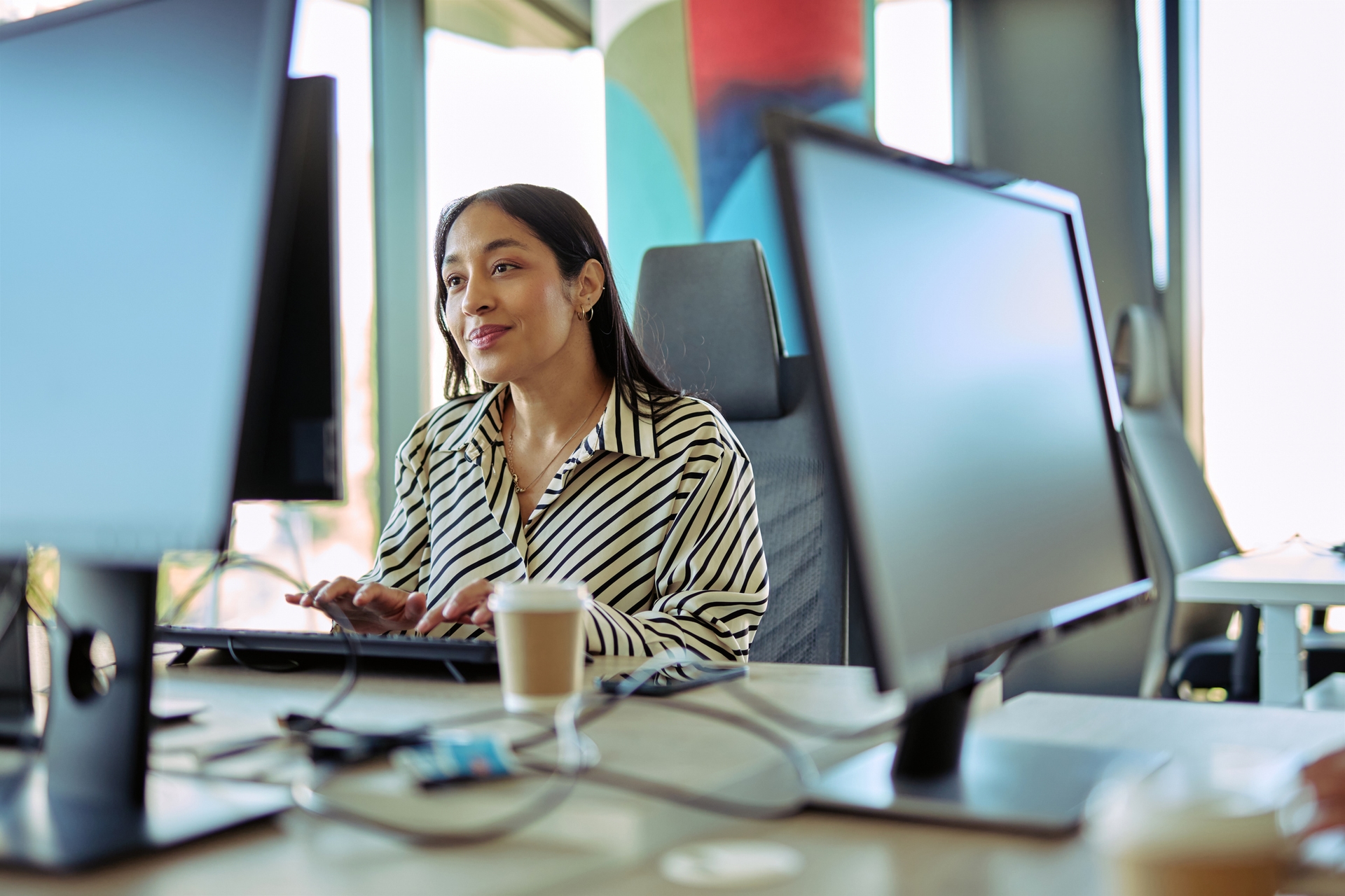 woman sitting at a desk