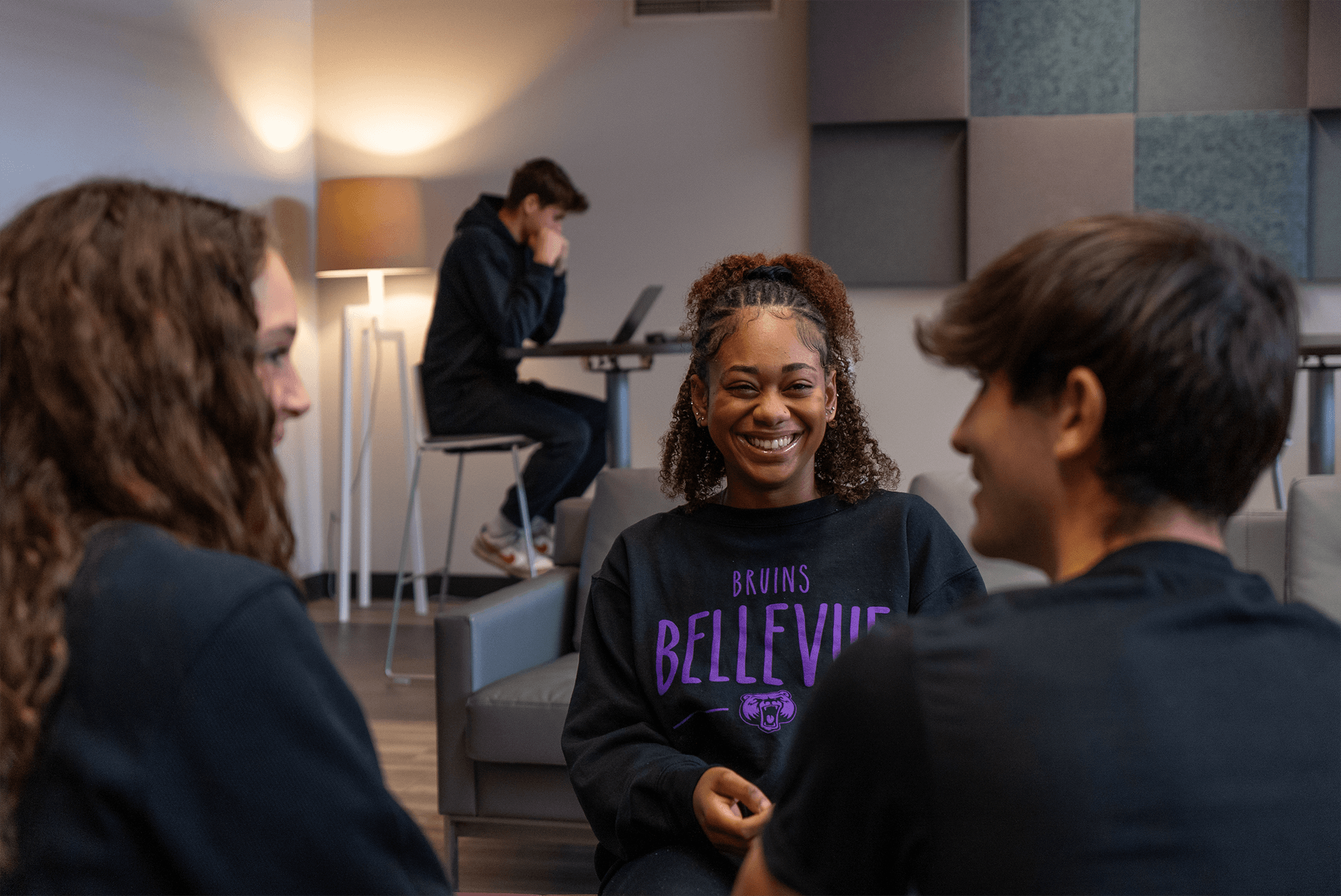 student with friends on campus